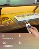 A desk with a keyboard, phone, and remote control, with LED lighting underneath the desk. Náhled obrázku produktu