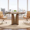 A round conference table with two chairs in an office setting with a city view. Anteprima dell’immagine prodotto
