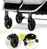 Close-up view of the wheels and frame of a double stroller, with inset images highlighting features. Produktbild-Vorschau