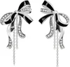 A pair of Thomas Sabo earrings shaped like bows with black enamel and diamonds. Produktbild-Vorschau