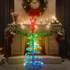 A festive Christmas scene with a spiral LED tree in front of a fireplace. Náhľad obrázku produktu
