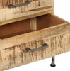 A close-up view of a wooden chest of drawers, showing the texture of the wood and the metal handles. Náhled obrázku produktu
