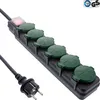 A black power strip with six green outlets and a red indicator light, connected to a black power cord with a European plug. Anteprima dell’immagine prodotto