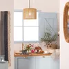 A kitchen scene with a hanging lamp, window, cabinets, and decorative items. Náhľad obrázku produktu