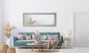 A living room scene with a sofa, coffee table, mirror, and decorative items. Náhled obrázku produktu