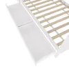 A close-up view of the drawers of a white wooden bed frame. Produktbild-Vorschau