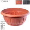 A terracotta planter pot is shown on a white background, with smaller images of other colored pots and size indicators. Produktbild-Vorschau