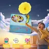 A child is playing with a toy record player in a dreamlike setting with clouds and stars. Náhľad obrázku produktu