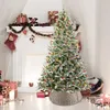 A decorated Christmas tree and fireplace scene with gifts. Produktbild-Vorschau