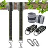 A set of hammock straps, swing attachments, and carabiners are displayed against a white background, with a tree branch and leaves in the upper portion of the image. Produktbild-Vorschau