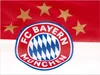A flag with the FC Bayern München logo and stars. Produktbild-Vorschau