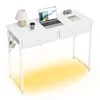 A white desk with a laptop, lamp, coffee cup, and headphones. Produktbild-Vorschau