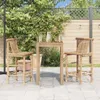 Two bamboo bar stools and a small wooden table are set up on a patio. Produktbild-Vorschau
