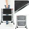 A collage of images showing a two-step folding step stool. Produktbild-Vorschau