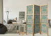 A living room scene with a sofa, coffee table, and a decorative screen. Anteprima dell’immagine prodotto
