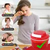 A woman is shown crying while preparing food, with inset images highlighting common kitchen problems like irritating eyes, risk of injury, and low efficiency. A red manual food chopper is shown with a green checkmark, implying it solves these problems. Produktbild-Vorschau