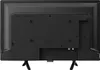 The back of a black television set with its stand attached. Voir les images du produit