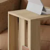 A close-up of a wooden side table with a laptop on top, placed next to a brown sofa. Produktbild-Vorschau