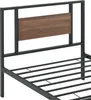 A close-up view of a bed frame's headboard and base. Produktbild-Vorschau
