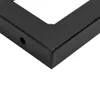 A close-up view of a black metal corner with a small hole, part of a larger structure. Náhled obrázku produktu