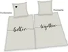 Two pillowcases and duvet covers are displayed side-by-side, showing the front and back sides. Produktbild-Vorschau