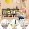 A collage showing a toy shelf with toys, a girl reading, and three inset images of a living room, a children's room, and a kindergarten. Podgląd zdjęcia produktu