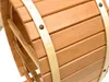 Close-up view of a wooden wine rack shaped like a barrel. Náhled obrázku produktu