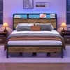 A bedroom scene featuring a bed with LED lighting and a headboard with storage. Produktbild-Vorschau