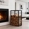 A modern living room with a fireplace and a firewood rack. Produktbild-Vorschau