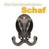 A cast iron coat hook shaped like a sheep's head, with text overlays. Produktbild-Vorschau