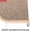 Close-up of the edge of a beige carpet stair mat, showing the finished edge and a red dotted line indicating a measurement. Produktbild-Vorschau