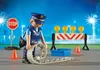 A Playmobil police officer is setting up a road block with a spike strip. Anteprima dell’immagine prodotto