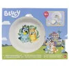The image shows the packaging of a Bluey-themed children's dinnerware set, featuring illustrations of the characters and the product contents. Voir les images du produit