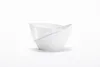 Two white bowls are stacked on a white surface. Náhled obrázku produktu