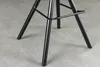 Close-up of the legs and footrest of a black bar stool. Produktbild-Vorschau