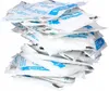 A stack of white plastic mailing bags with blue text and logos. Náhľad obrázku produktu