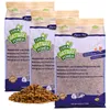 Three bags of pet food are shown, with a pile of the food in front of them. Produktbild-Vorschau