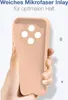 A hand holding a pink phone case with a microfiber inlay visible inside. Produktbild-Vorschau