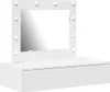 A white vanity table with a lighted mirror and a drawer. Náhled obrázku produktu