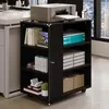 A dark wood-effect printer stand with shelves, holding office supplies and a printer, in an office environment. Náhled obrázku produktu