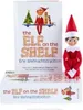 A product shot of The Elf on the Shelf book and doll set, with the book open and the doll standing beside it. Produktbild-Vorschau