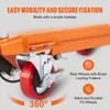 Close-up of a red caster wheel with a brake mechanism on an orange industrial lift table, with text highlighting features. Voir les images du produit