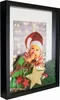 A shadow box frame with a Christmas-themed baby photo and decorative elements. Produktbild-Vorschau