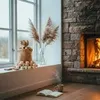 A cozy indoor scene with a fireplace and a window. Náhled obrázku produktu
