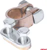 A close-up studio shot of a battery terminal clamp and a separate connector plate with bolts. Náhled obrázku produktu