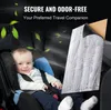 A baby sits in a car seat next to a sound dampening mat. Anteprima dell’immagine prodotto