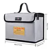 A fireproof LIPO-SAFE bag is shown against a white background with dimensions indicated. Produktbild-Vorschau