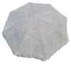 An open umbrella with a leaf-like pattern. Produktbild-Vorschau