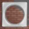A silver metal rosette with a circular opening is shown against a blurred brick background. Produktbild-Vorschau