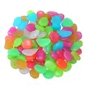 A pile of colorful, glowing pebbles. Produktbild-Vorschau